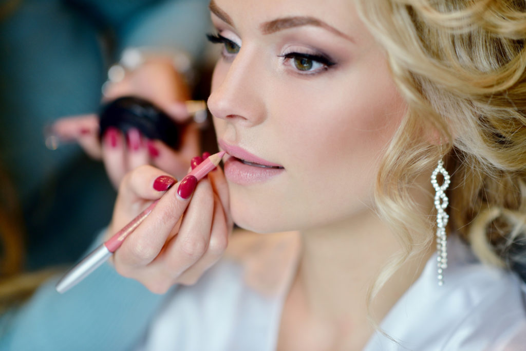 Wedding makeup artist making a make up for bride KASIA®